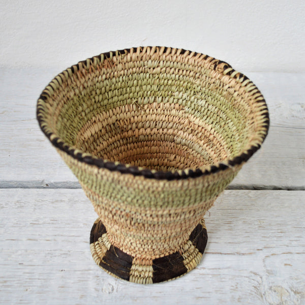 Woven rustic bowl with cup shape