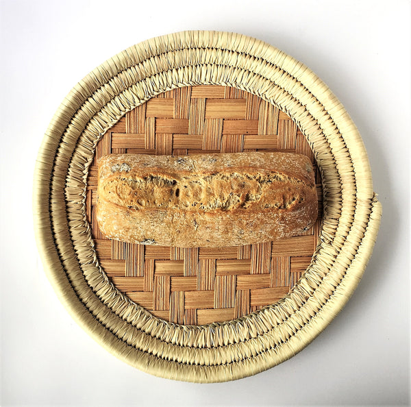 Round hand-woven bread basket (made of palm leaves)