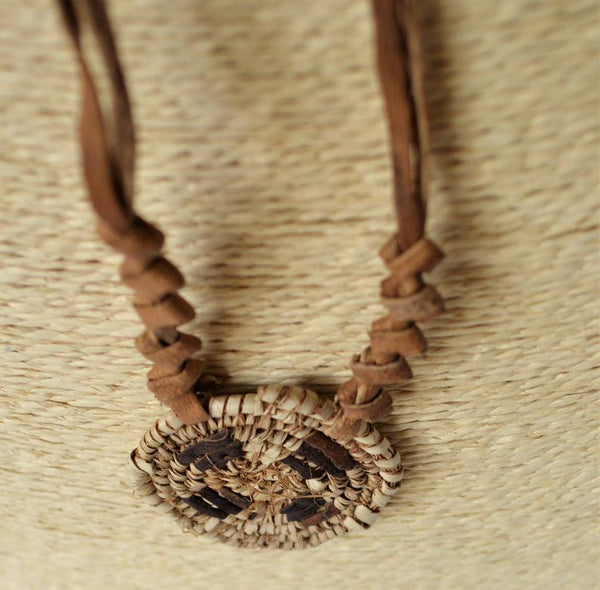African necklace from natural leather and palm straw