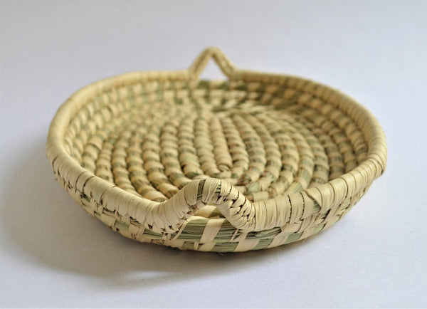 Oval woven platter from Fayoum